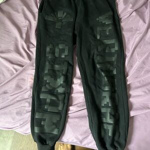Vertabrae "STXPM" collab sweatpants in black